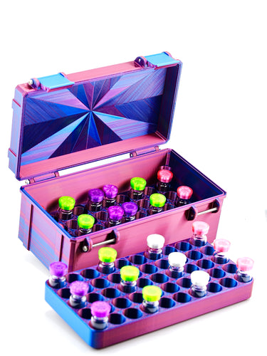 Colorful case with various small bottles on a white background